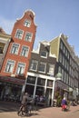 View of historic residential and commercial buildings on the corner of Prinsengracht and Bloemgracht in Amsterdam